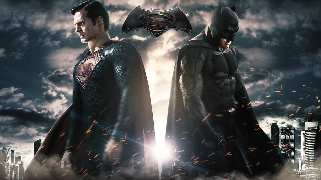 Henry Cavill as Superman facing off against Ben Affleck’s Batman under a stormy sky.